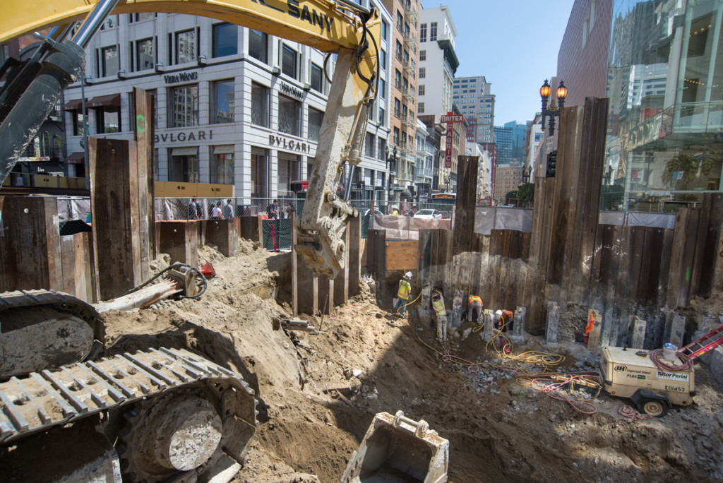 At the intersection of Stockton and Geary work to construction portion of the station roof has begun  